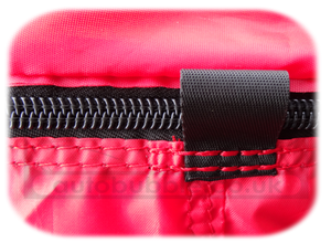 Plastic coated zip with internal protection skirt
